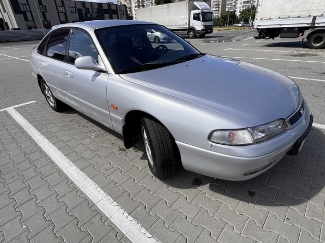 Серый Мазда 626, объемом двигателя 2.5 л и пробегом 300 тыс. км за 2200 $, фото 1 на Automoto.ua