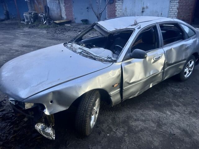 Серый Мазда 626, объемом двигателя 1.8 л и пробегом 100 тыс. км за 300 $, фото 1 на Automoto.ua