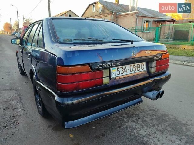Синій Мазда 626, об'ємом двигуна 2 л та пробігом 300 тис. км за 750 $, фото 4 на Automoto.ua