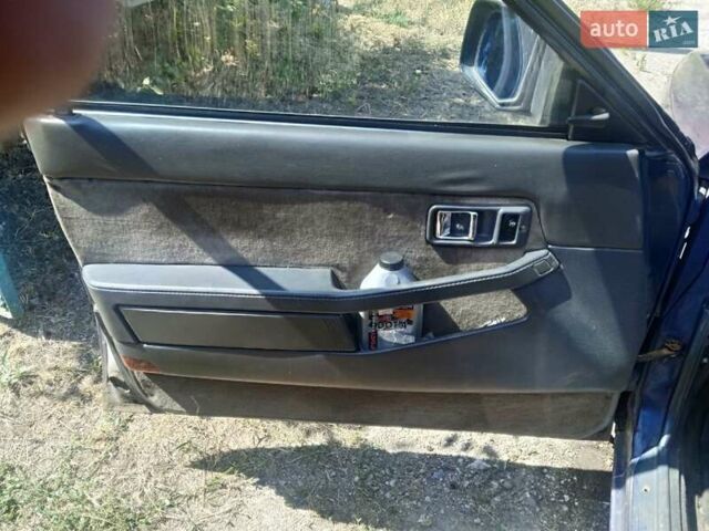 Синій Мазда 626, об'ємом двигуна 1.8 л та пробігом 354 тис. км за 1000 $, фото 6 на Automoto.ua