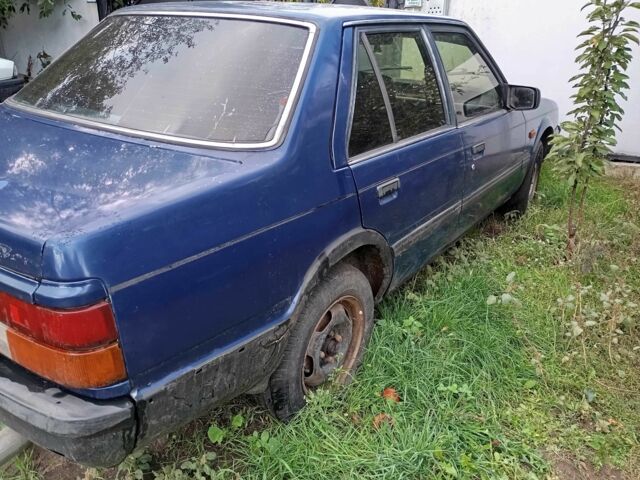 Синій Мазда 626, об'ємом двигуна 2 л та пробігом 200 тис. км за 700 $, фото 3 на Automoto.ua