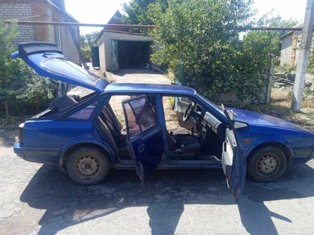 Синий Мазда 626, объемом двигателя 1.8 л и пробегом 354 тыс. км за 1000 $, фото 1 на Automoto.ua