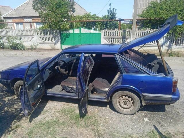 Синий Мазда 626, объемом двигателя 1.8 л и пробегом 354 тыс. км за 1000 $, фото 2 на Automoto.ua