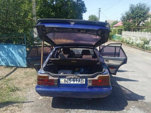 Синий Мазда 626, объемом двигателя 1.8 л и пробегом 354 тыс. км за 1000 $, фото 3 на Automoto.ua