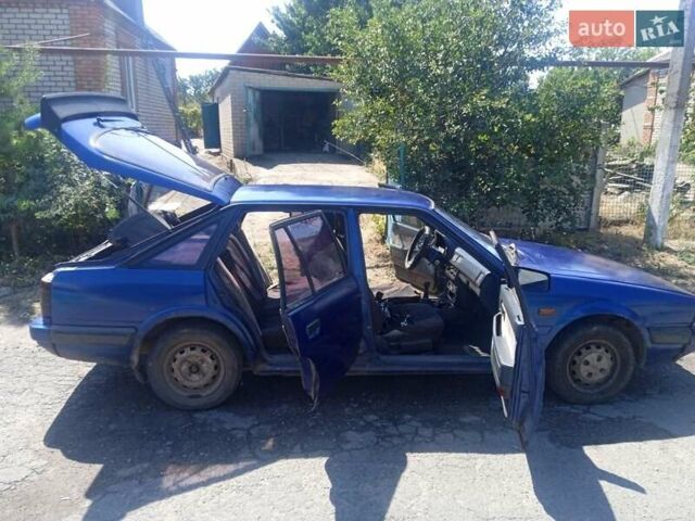 Синій Мазда 626, об'ємом двигуна 1.8 л та пробігом 354 тис. км за 1000 $, фото 5 на Automoto.ua