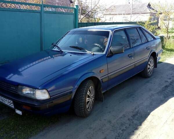 Синий Мазда 626, объемом двигателя 2 л и пробегом 400 тыс. км за 2000 $, фото 7 на Automoto.ua