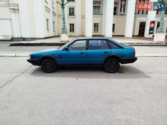 Синий Мазда 626, объемом двигателя 2 л и пробегом 500 тыс. км за 1001 $, фото 7 на Automoto.ua