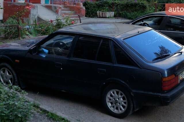 Синій Мазда 626, об'ємом двигуна 1.59 л та пробігом 309 тис. км за 1200 $, фото 1 на Automoto.ua