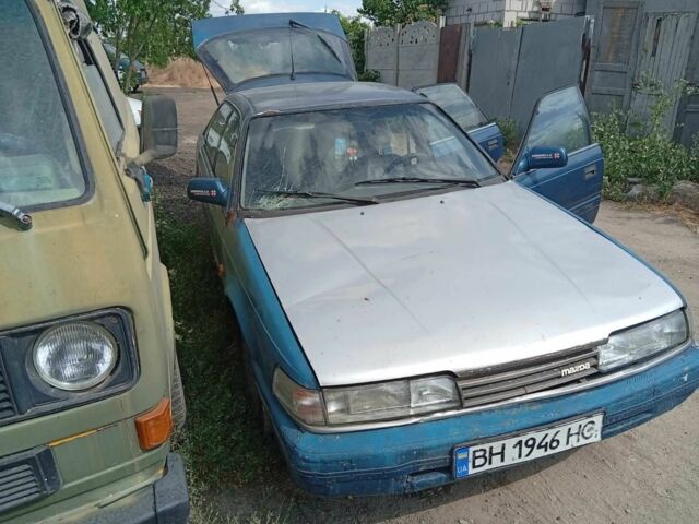 Синій Мазда 626, об'ємом двигуна 2 л та пробігом 250 тис. км за 603 $, фото 2 на Automoto.ua