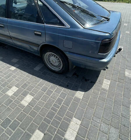 Синий Мазда 626, объемом двигателя 2 л и пробегом 500 тыс. км за 1000 $, фото 2 на Automoto.ua