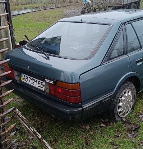 Синий Мазда 626, объемом двигателя 2 л и пробегом 205 тыс. км за 600 $, фото 2 на Automoto.ua