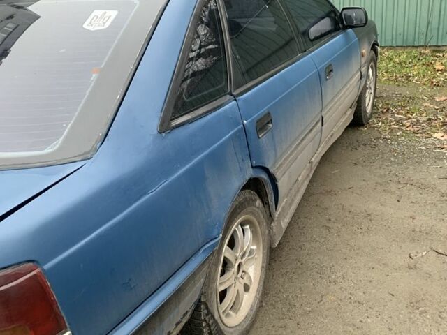 Синий Мазда 626, объемом двигателя 1.8 л и пробегом 500 тыс. км за 284 $, фото 3 на Automoto.ua