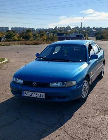 Синий Мазда 626, объемом двигателя 1.99 л и пробегом 300 тыс. км за 1900 $, фото 1 на Automoto.ua