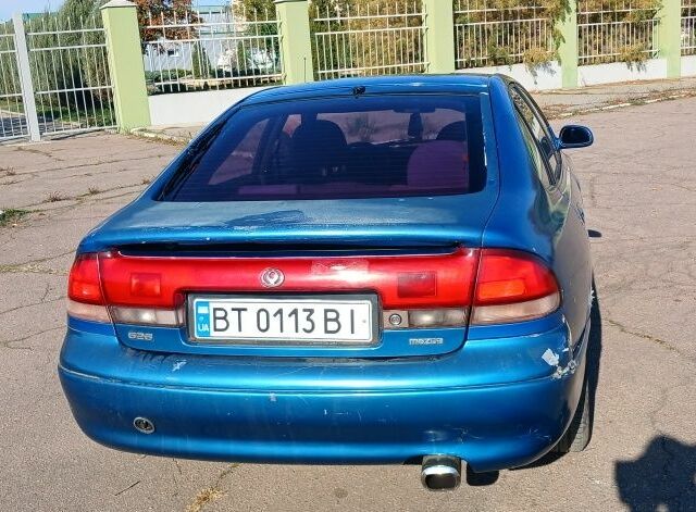 Синій Мазда 626, об'ємом двигуна 2 л та пробігом 400 тис. км за 2000 $, фото 4 на Automoto.ua