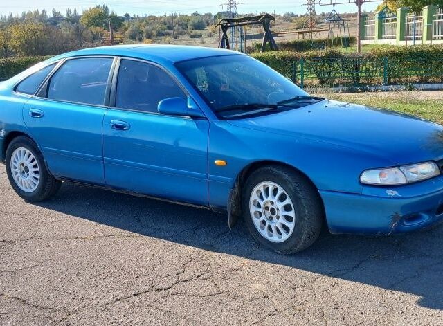 Синій Мазда 626, об'ємом двигуна 2 л та пробігом 400 тис. км за 2000 $, фото 1 на Automoto.ua