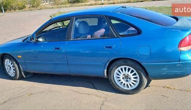 Синий Мазда 626, объемом двигателя 1.99 л и пробегом 300 тыс. км за 1900 $, фото 3 на Automoto.ua