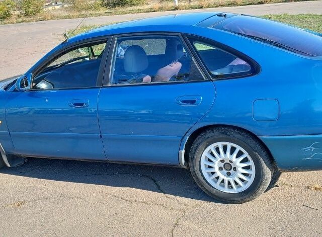 Синій Мазда 626, об'ємом двигуна 2 л та пробігом 400 тис. км за 2000 $, фото 3 на Automoto.ua