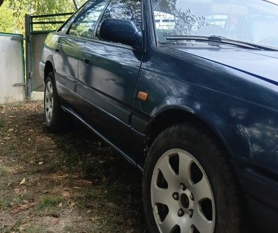 Синий Мазда 626, объемом двигателя 0 л и пробегом 200 тыс. км за 649 $, фото 2 на Automoto.ua