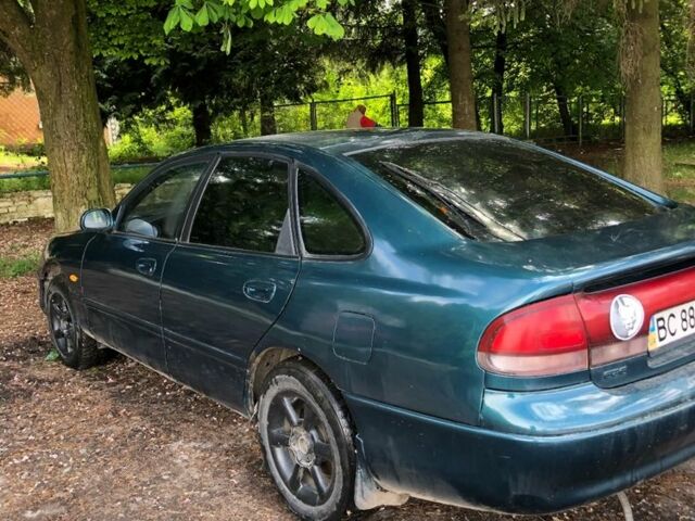 Синий Мазда 626, объемом двигателя 2 л и пробегом 400 тыс. км за 1500 $, фото 3 на Automoto.ua