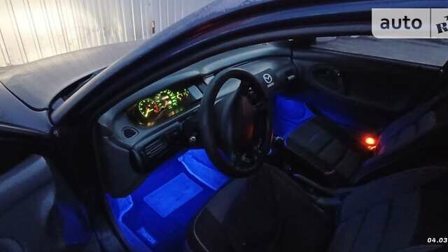 Синій Мазда 626, об'ємом двигуна 1.84 л та пробігом 310 тис. км за 2000 $, фото 11 на Automoto.ua