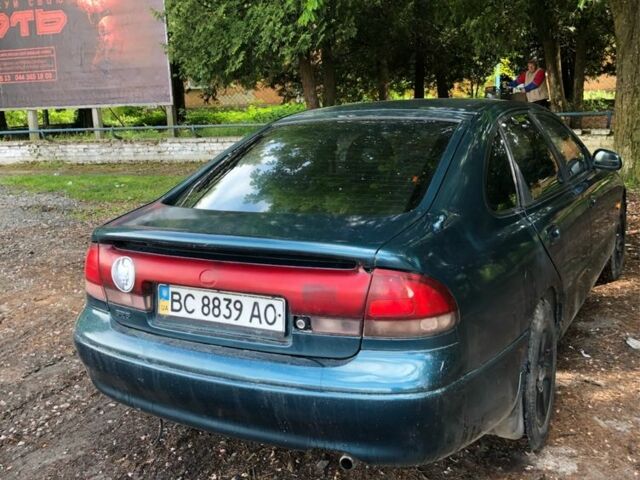 Синий Мазда 626, объемом двигателя 2 л и пробегом 400 тыс. км за 1500 $, фото 4 на Automoto.ua