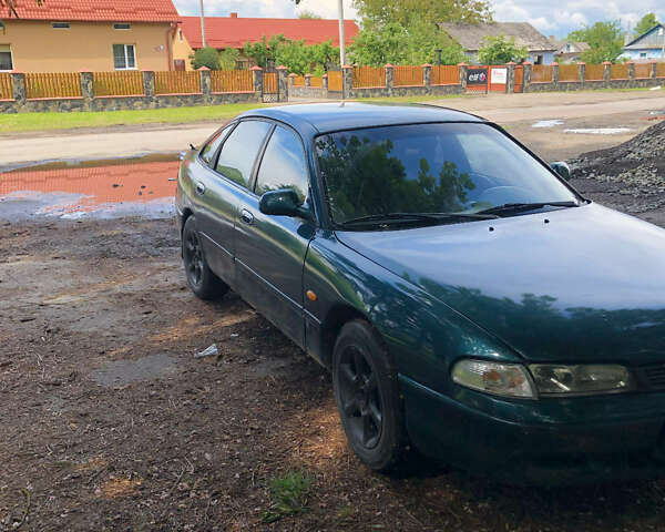 Синий Мазда 626, объемом двигателя 2 л и пробегом 400 тыс. км за 1500 $, фото 1 на Automoto.ua