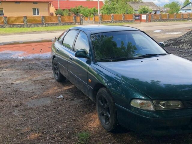 Синий Мазда 626, объемом двигателя 2 л и пробегом 400 тыс. км за 1500 $, фото 2 на Automoto.ua