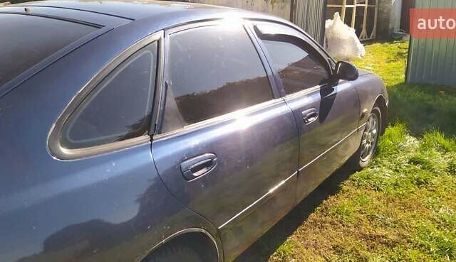 Синий Мазда 626, объемом двигателя 1.8 л и пробегом 280 тыс. км за 2500 $, фото 4 на Automoto.ua