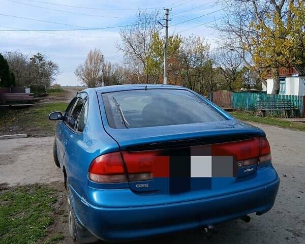 Синий Мазда 626, объемом двигателя 2 л и пробегом 491 тыс. км за 1999 $, фото 2 на Automoto.ua