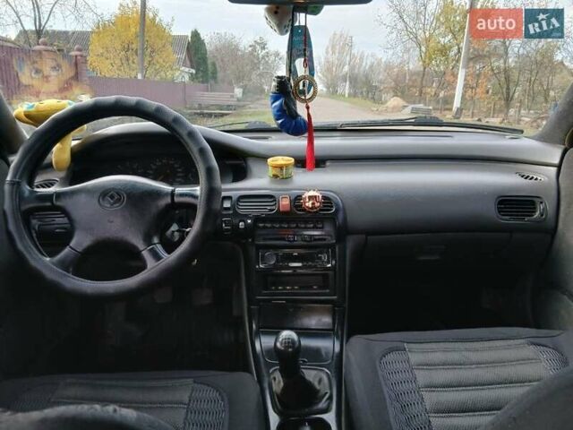 Синий Мазда 626, объемом двигателя 2 л и пробегом 491 тыс. км за 1999 $, фото 4 на Automoto.ua