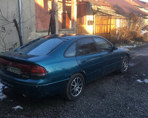 Синий Мазда 626, объемом двигателя 2 л и пробегом 500 тыс. км за 2100 $, фото 1 на Automoto.ua