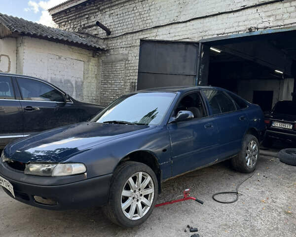 Синий Мазда 626, объемом двигателя 2 л и пробегом 300 тыс. км за 1600 $, фото 20 на Automoto.ua