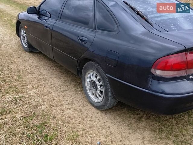 Синій Мазда 626, об'ємом двигуна 1.84 л та пробігом 133 тис. км за 1700 $, фото 4 на Automoto.ua