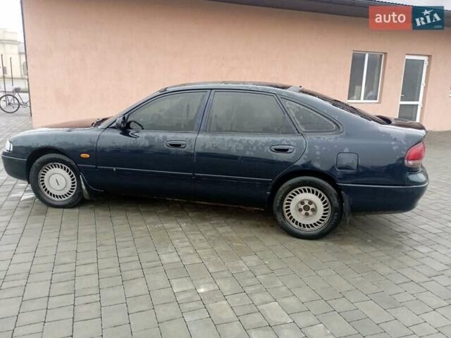 Синій Мазда 626, об'ємом двигуна 1.8 л та пробігом 295 тис. км за 1650 $, фото 4 на Automoto.ua