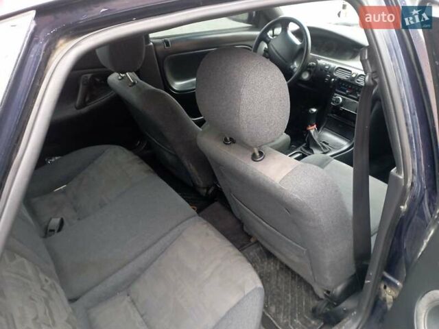 Синій Мазда 626, об'ємом двигуна 1.8 л та пробігом 295 тис. км за 1650 $, фото 8 на Automoto.ua