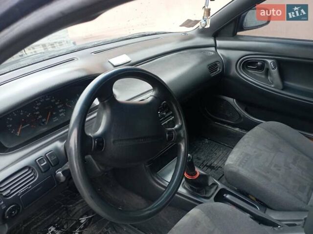 Синій Мазда 626, об'ємом двигуна 1.8 л та пробігом 295 тис. км за 1650 $, фото 9 на Automoto.ua