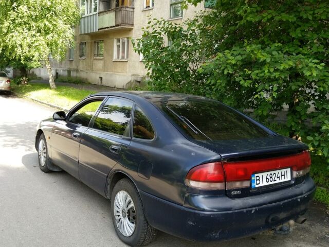 Синий Мазда 626, объемом двигателя 1.8 л и пробегом 420 тыс. км за 1500 $, фото 1 на Automoto.ua