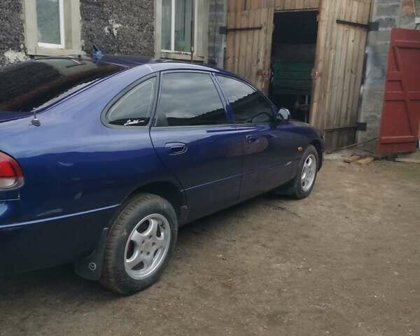 Синій Мазда 626, об'ємом двигуна 1.8 л та пробігом 270 тис. км за 2400 $, фото 7 на Automoto.ua