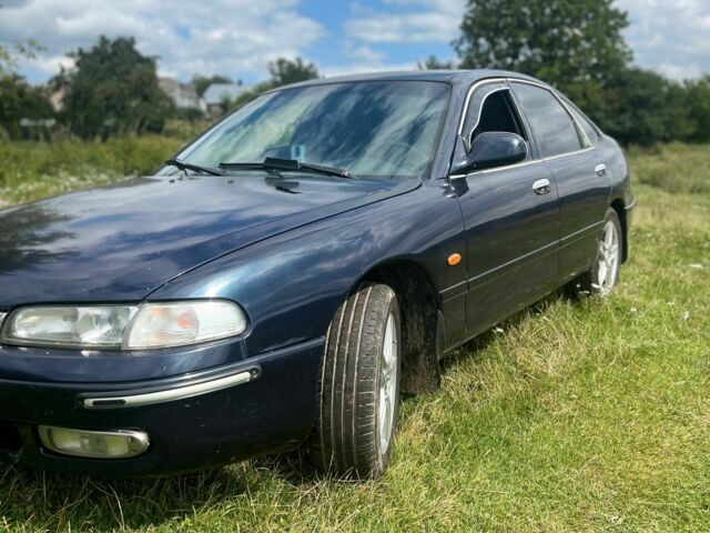 Синий Мазда 626, объемом двигателя 2 л и пробегом 400 тыс. км за 3000 $, фото 1 на Automoto.ua