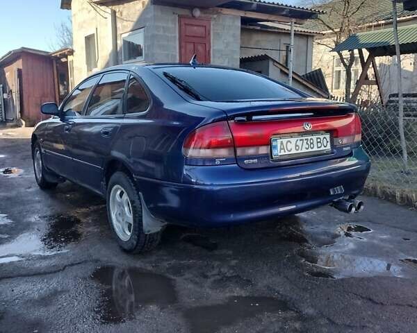 Синій Мазда 626, об'ємом двигуна 1.8 л та пробігом 270 тис. км за 2400 $, фото 13 на Automoto.ua