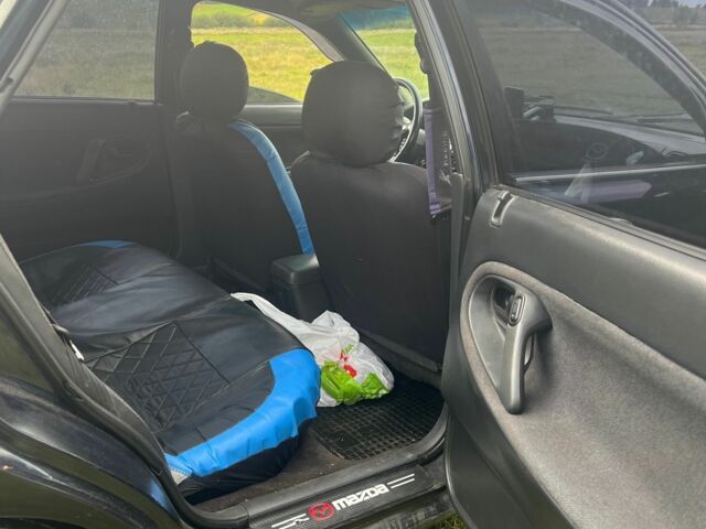 Синий Мазда 626, объемом двигателя 2 л и пробегом 400 тыс. км за 3000 $, фото 6 на Automoto.ua