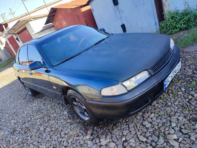 Синій Мазда 626, об'ємом двигуна 1.8 л та пробігом 456 тис. км за 899 $, фото 1 на Automoto.ua
