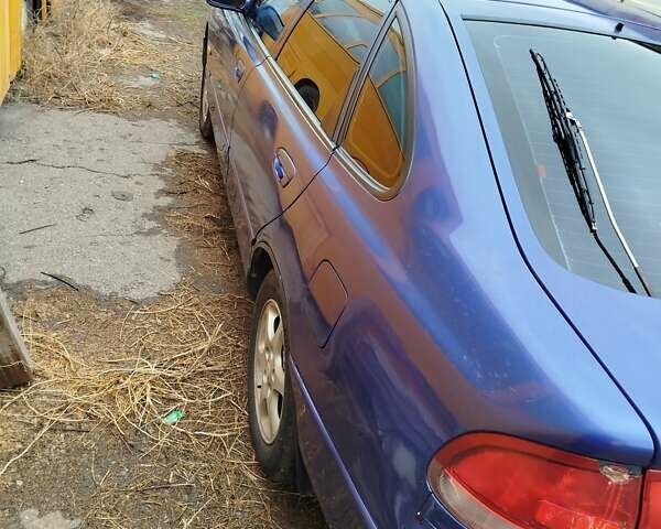 Синій Мазда 626, об'ємом двигуна 1.8 л та пробігом 250 тис. км за 1650 $, фото 1 на Automoto.ua