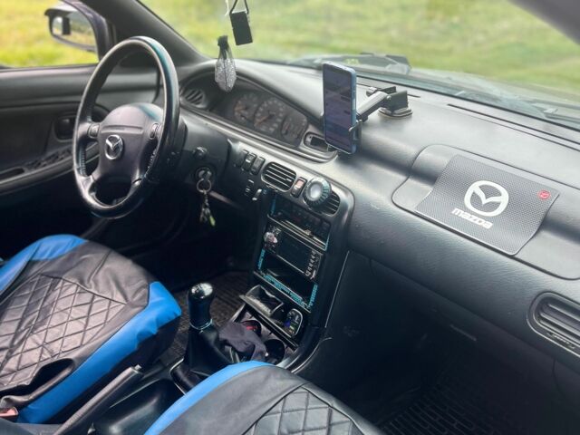 Синий Мазда 626, объемом двигателя 2 л и пробегом 400 тыс. км за 3000 $, фото 5 на Automoto.ua