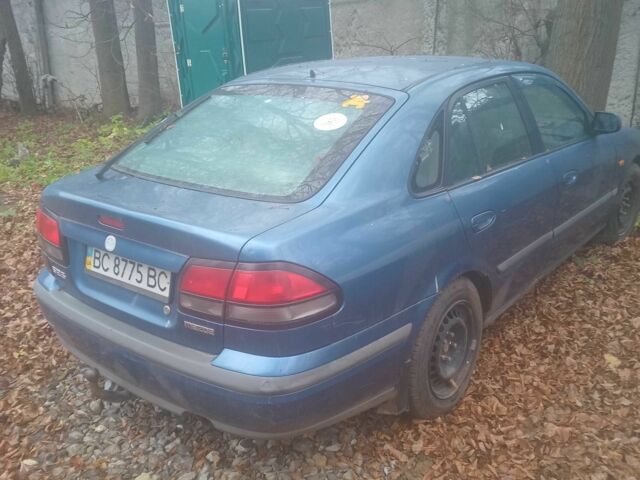 Синий Мазда 626, объемом двигателя 2 л и пробегом 3 тыс. км за 591 $, фото 2 на Automoto.ua