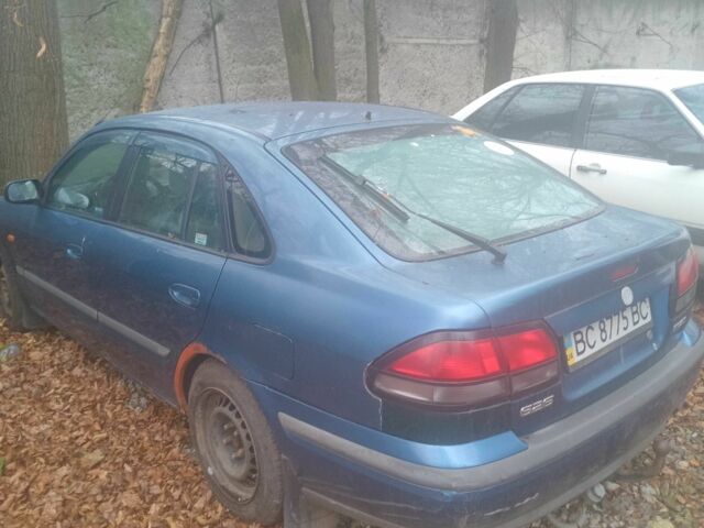 Синий Мазда 626, объемом двигателя 2 л и пробегом 3 тыс. км за 591 $, фото 3 на Automoto.ua