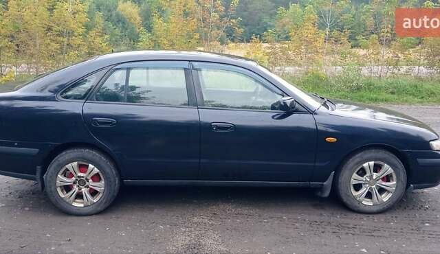 Синий Мазда 626, объемом двигателя 1.8 л и пробегом 319 тыс. км за 2300 $, фото 3 на Automoto.ua