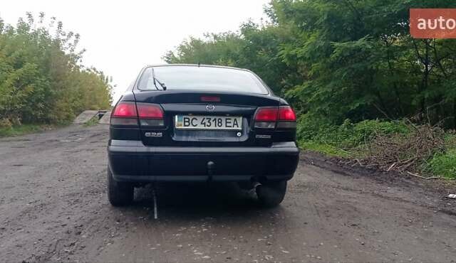Синий Мазда 626, объемом двигателя 1.8 л и пробегом 319 тыс. км за 2300 $, фото 4 на Automoto.ua