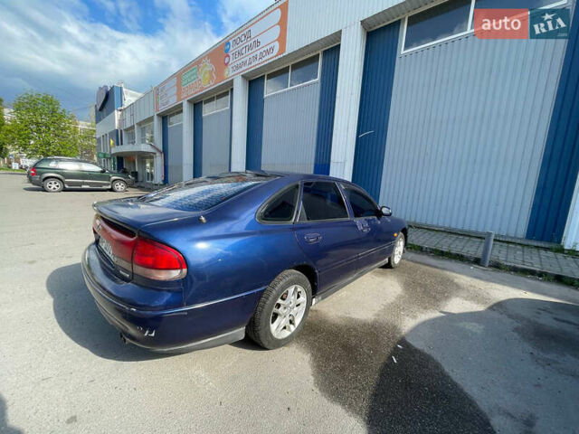 Синий Мазда 626, объемом двигателя 2.5 л и пробегом 341 тыс. км за 2800 $, фото 2 на Automoto.ua