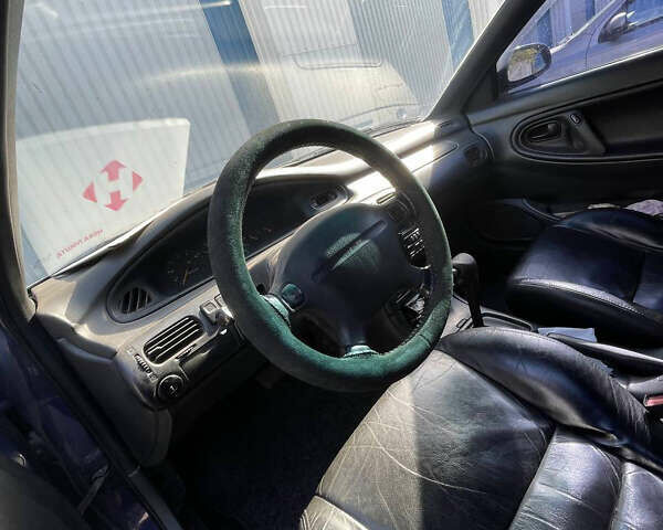 Синий Мазда 626, объемом двигателя 2.5 л и пробегом 341 тыс. км за 2800 $, фото 5 на Automoto.ua